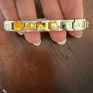 Casa D’Oro Stainless Steel charm bracelet with Garfield and Yodi